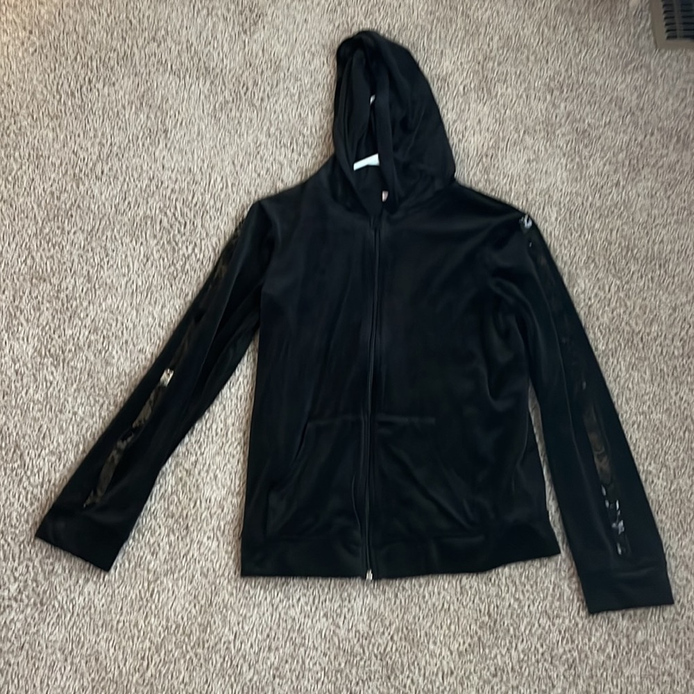 Adorable black velour zip up with sequins down the arms.